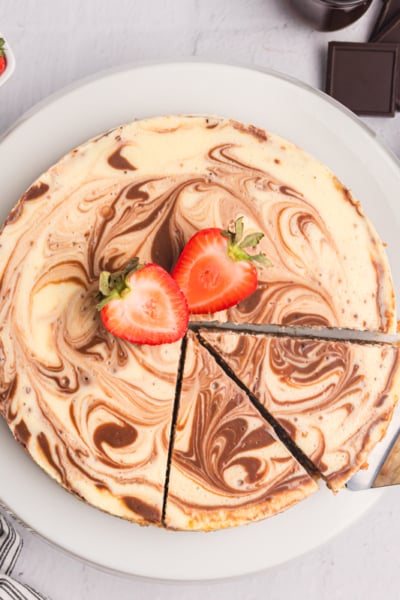 overhead shot of sliced marble cheesecake