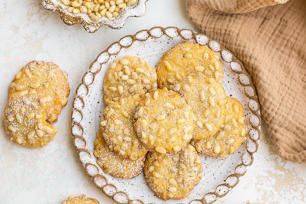 overhead shot of plate of pine nut cookies