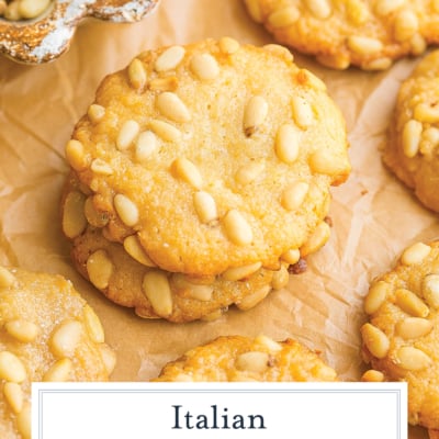 stack of pignoli cookies with text overlay