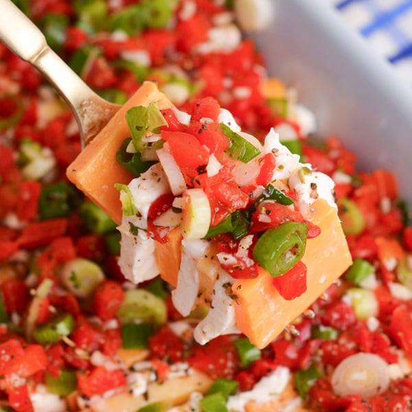 southern marinated cheese on fork