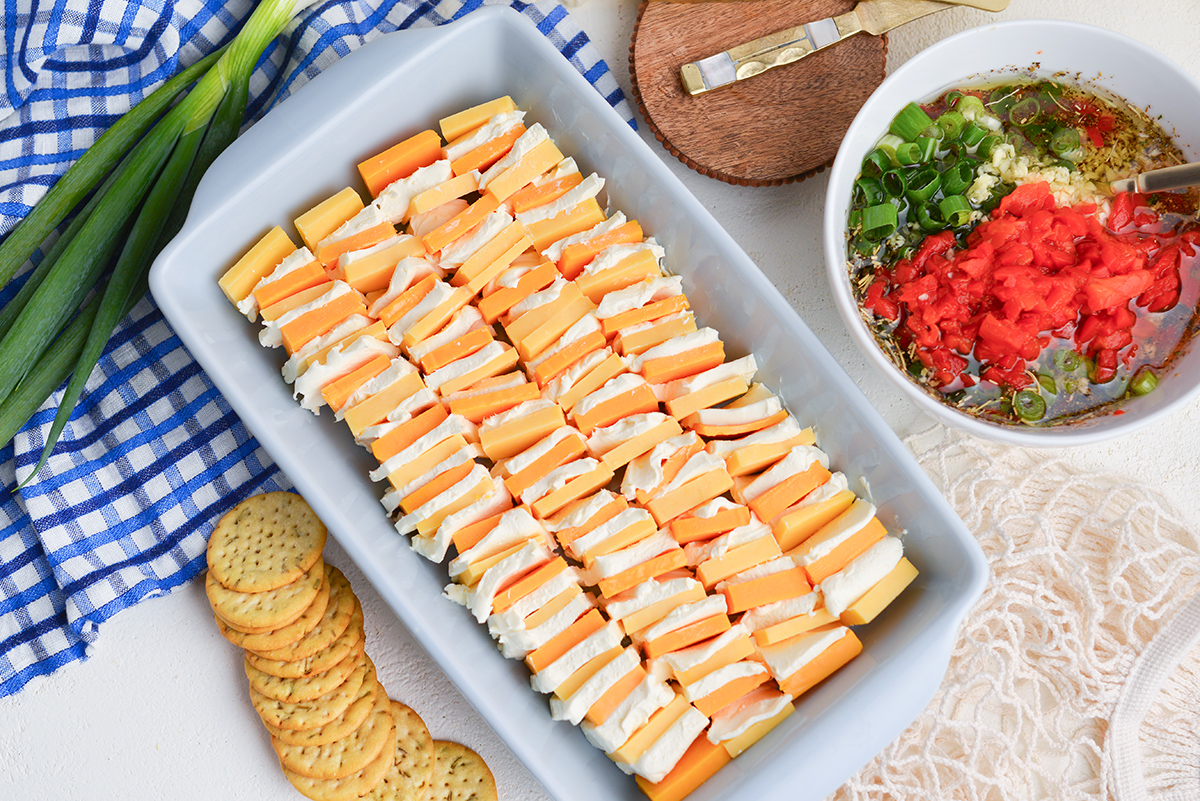 slices of cheese and cream cheese in dish