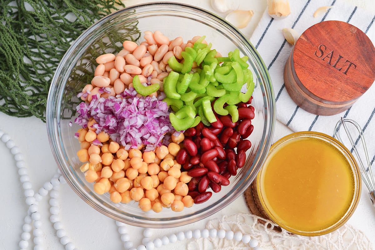 beans, celery, onion and chickpeas in bowl