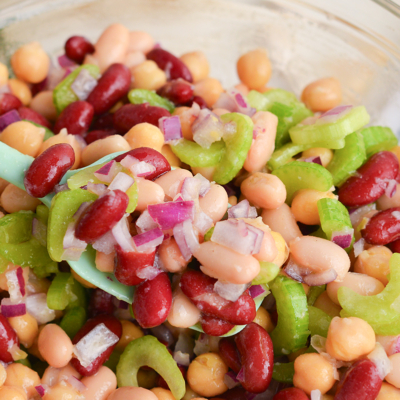 spatula in bowl of bean salad