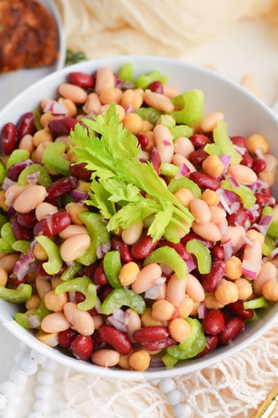 angled shot of bowl of three bean salad