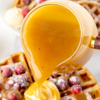 eggnog syrup pouring onto waffles