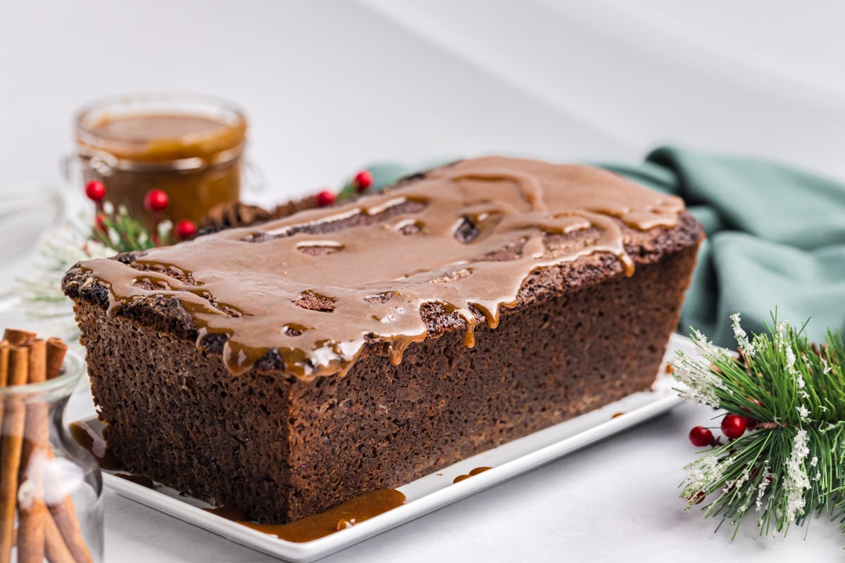 gingerbread loaf topped with caramel sauce