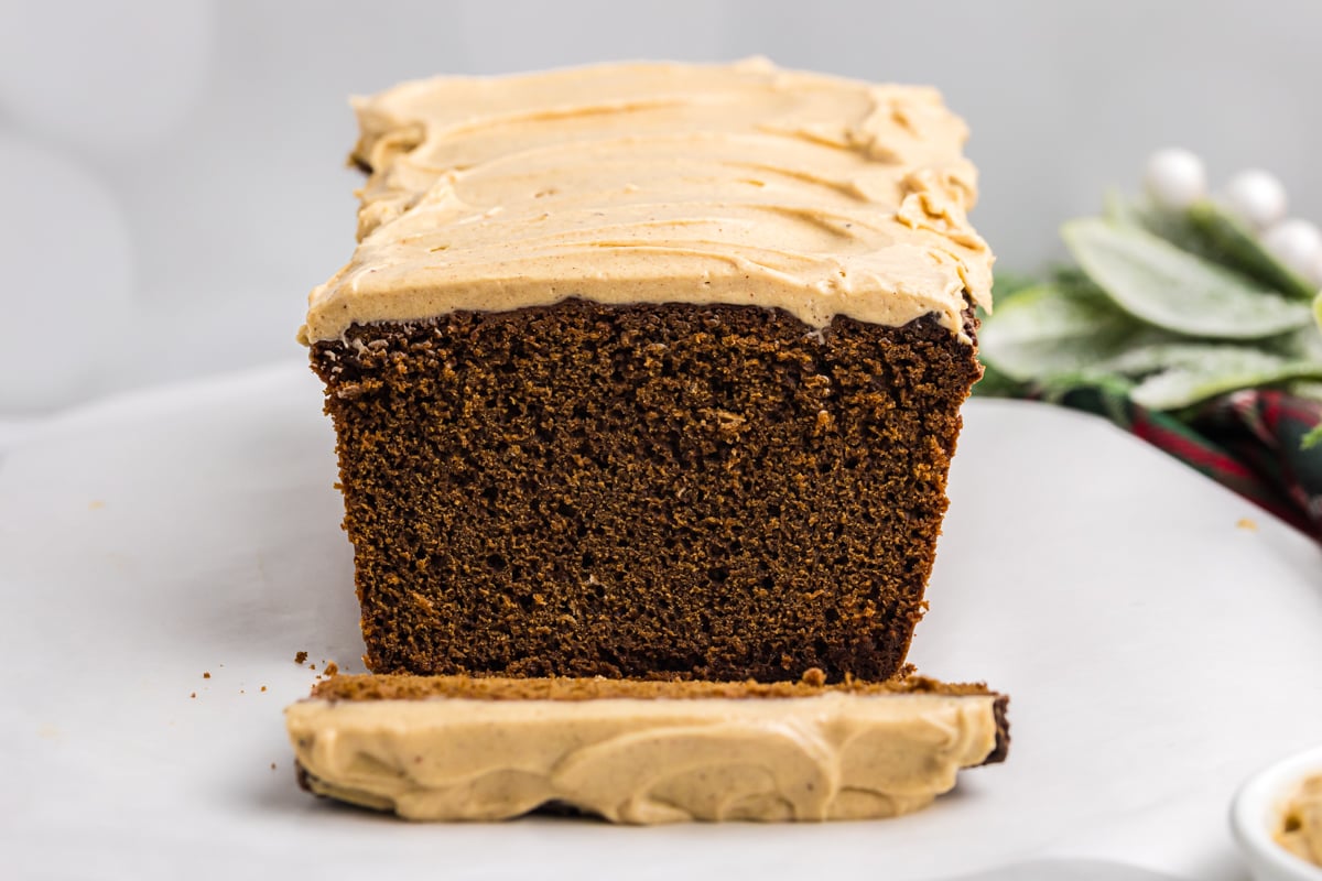 straight on shot of slice taken off of loaf cake