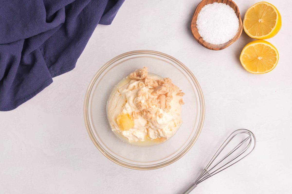 overhead shot of aioli ingredients in bowl
