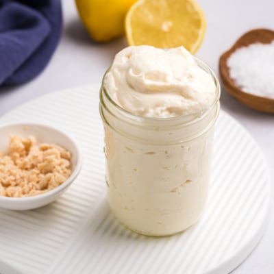 angled shot of jar of horseradish aioli
