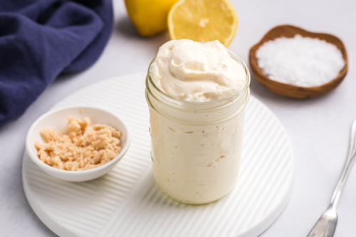 angled shot of jar of horseradish aioli