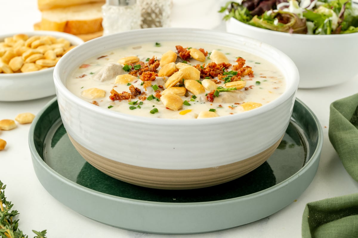 angled shot of bowl of oyster chowder
