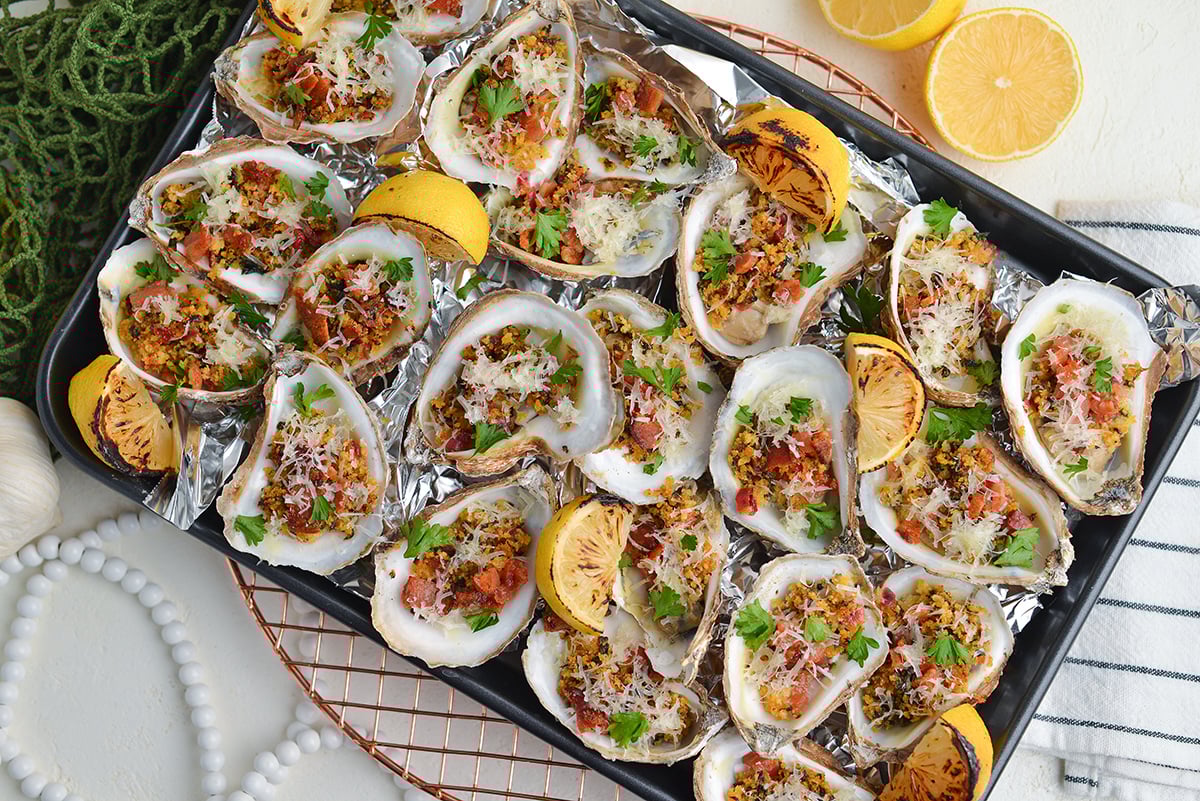 overhead shot of tray of oysters rockefeller