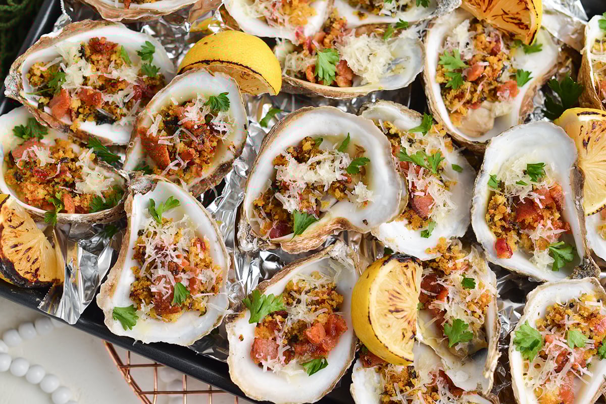 close up overhead shot of tray of oysters rockefeller