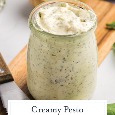 angled shot of jar of pesto aioli with text overlay