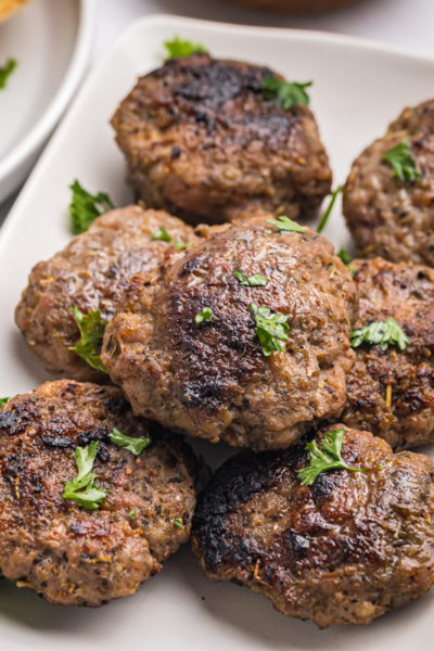 angled shot of tray of sausage patties