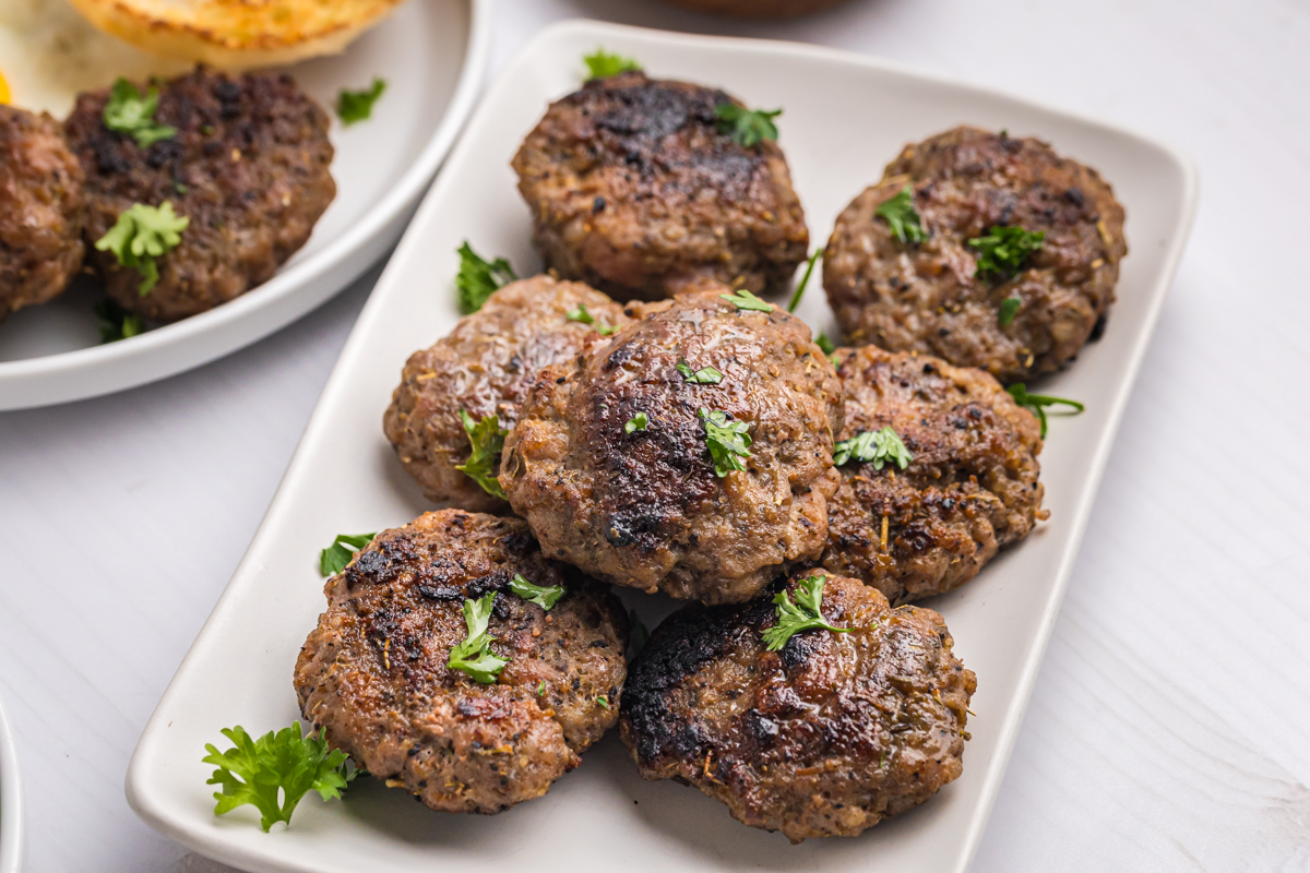 angled shot of tray of sausage patties
