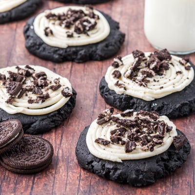 angled shot of oreo sugar cookies with straws and oreos