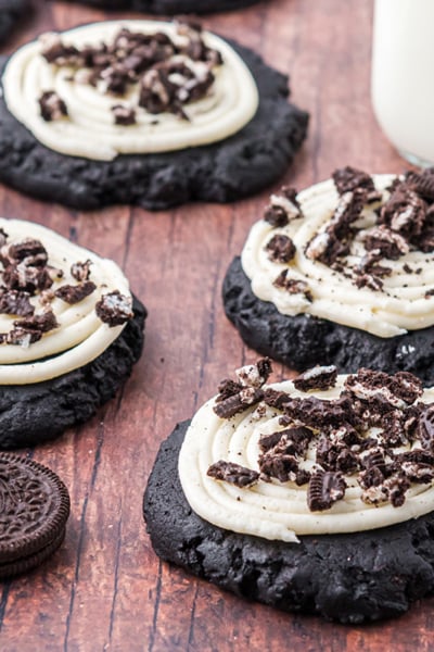 angled shot of oreo sugar cookies with straws and oreos