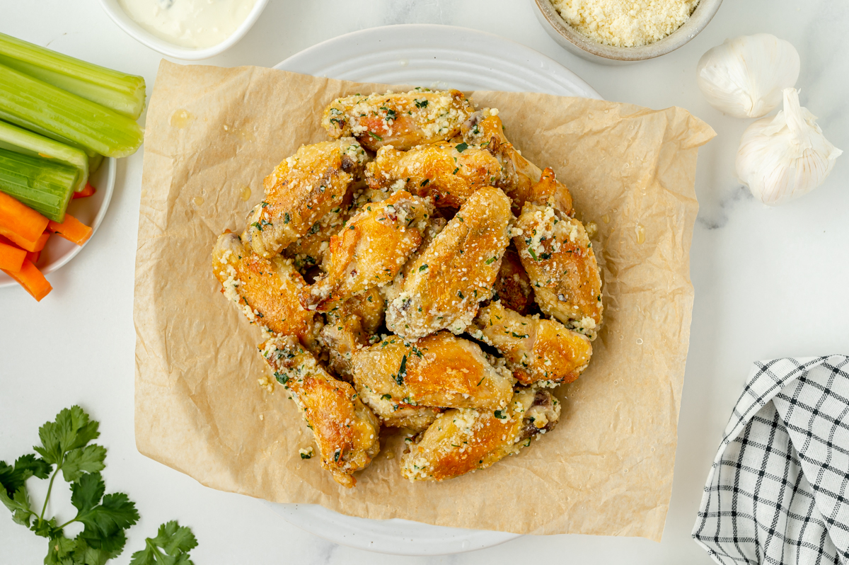 overhead shot of bowl of garlic parmesan wings