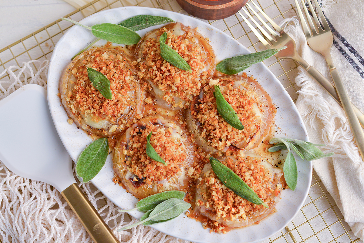 overhead serving platter of melting onions with sage