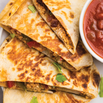 overhead shot of quesadillas on plate with text overlay