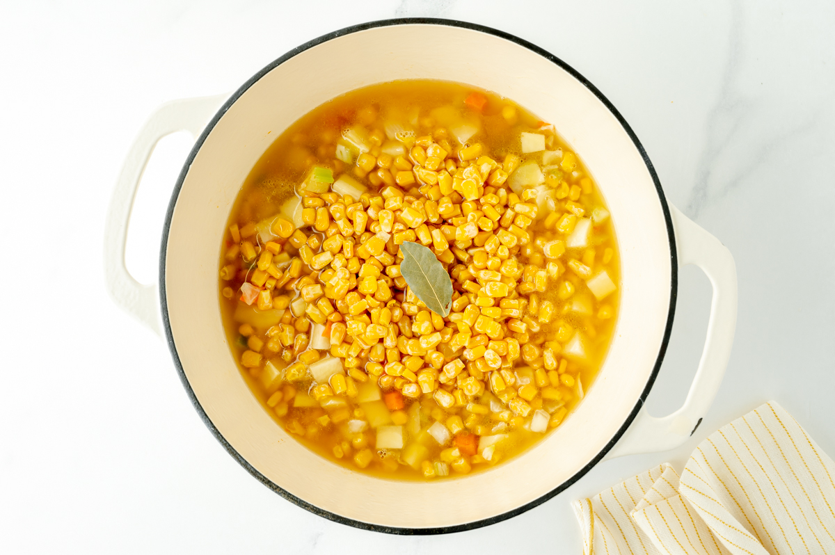 overhead shot of chowder ingredients in pot