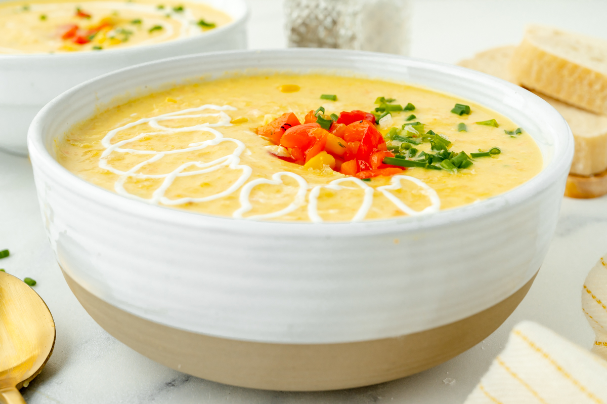 angled shot of bowl of corn chowder