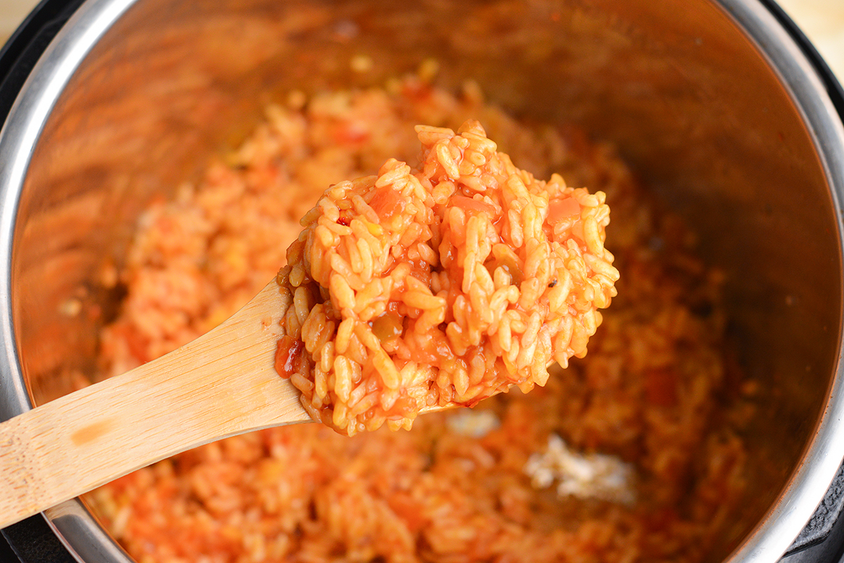 cooked rice on spoon