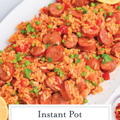 angled shot of chicken paella on platter with text overlay