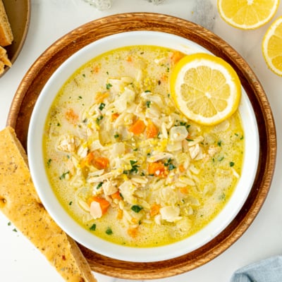 overhead shot of bowl of lemon chicken orzo soup