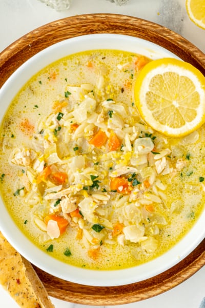 overhead shot of bowl of lemon chicken orzo soup