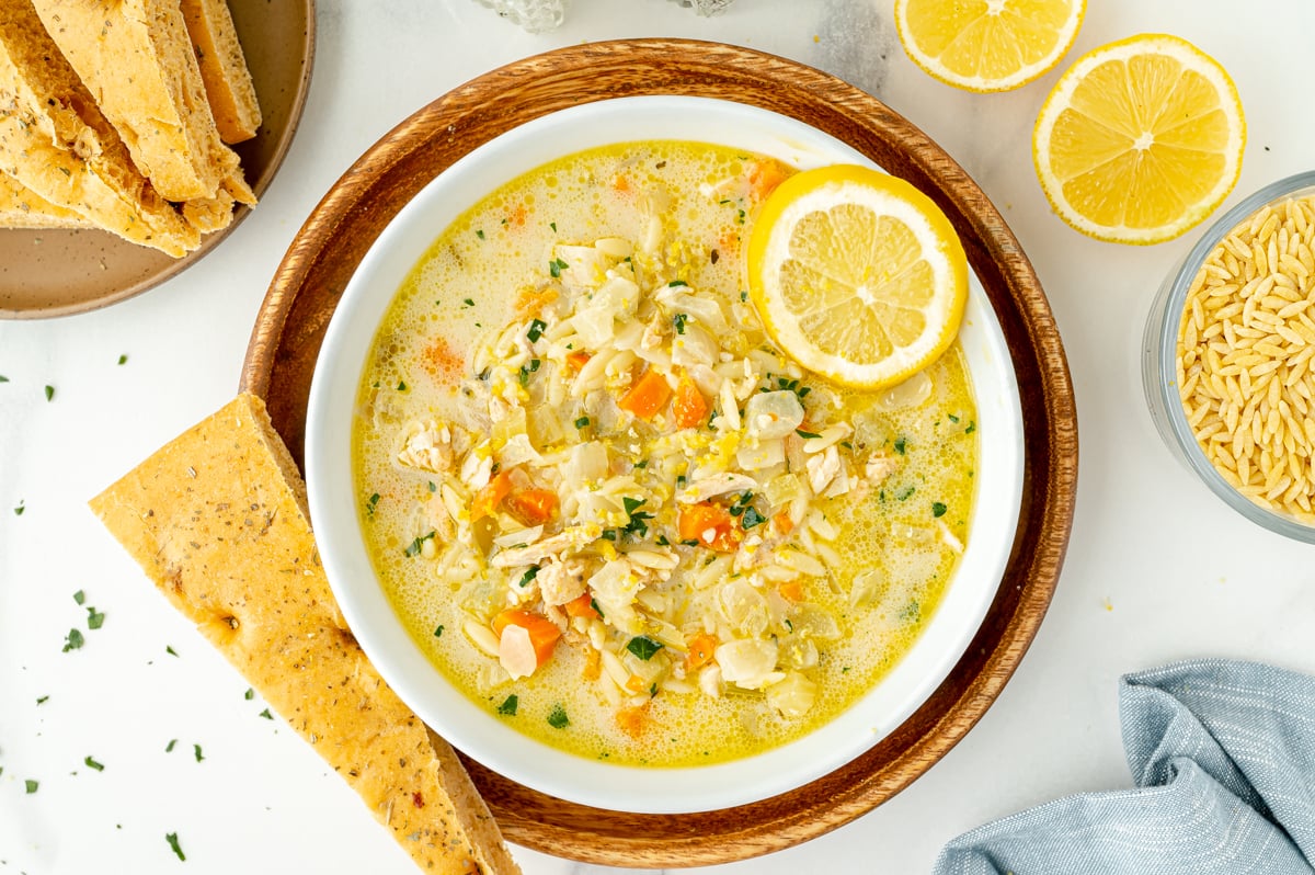 overhead shot of bowl of lemon chicken orzo soup