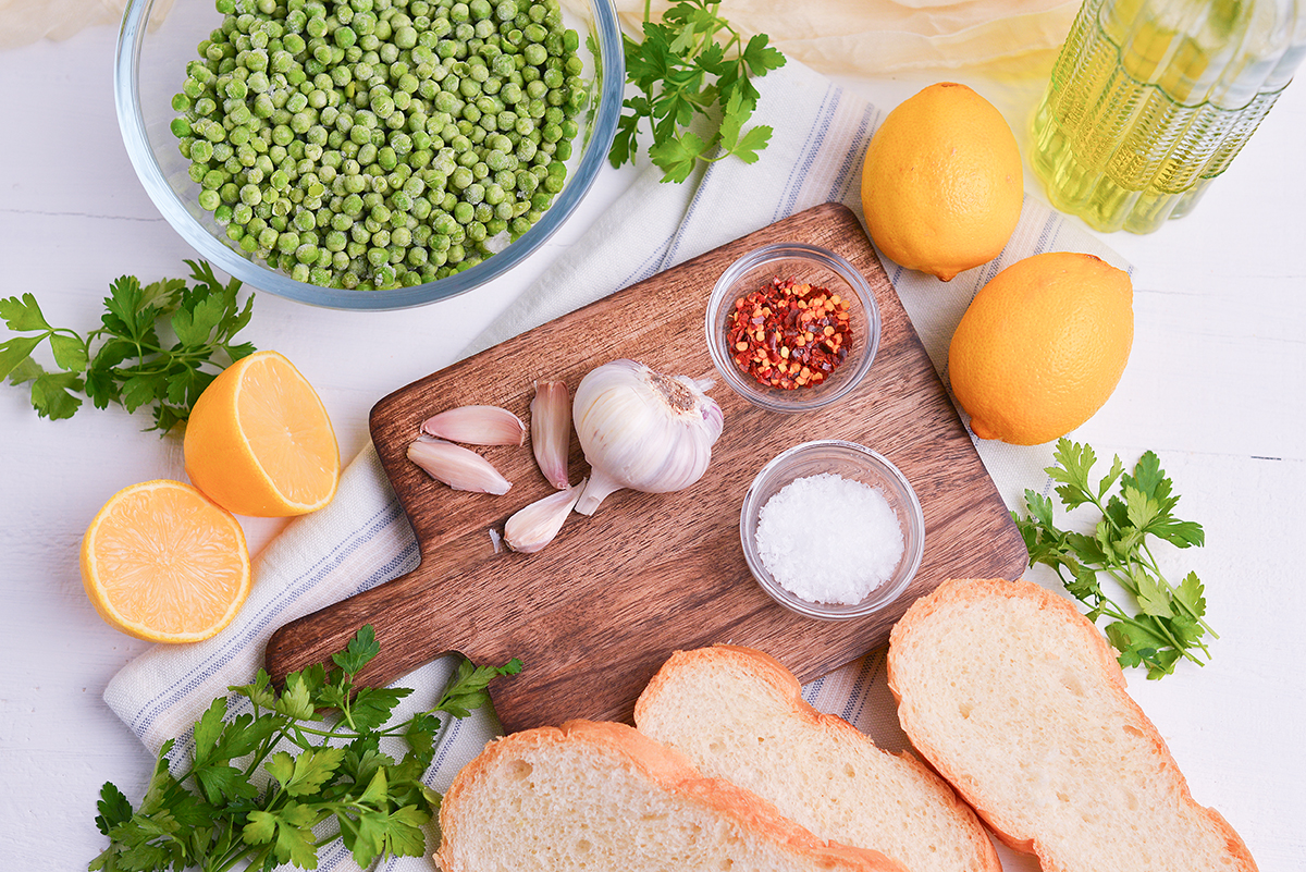 overhead shot of pea mash crostini ingredients