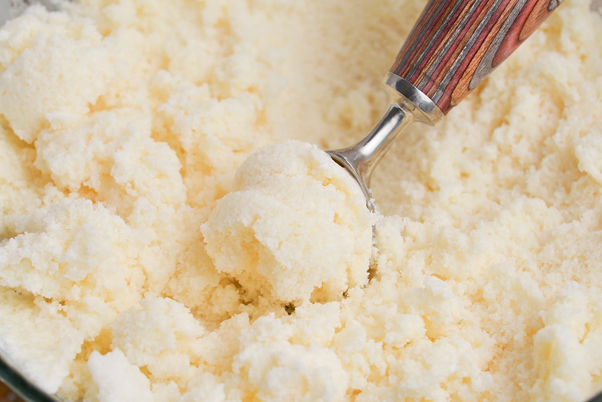 close up scoop of frozen snow cream