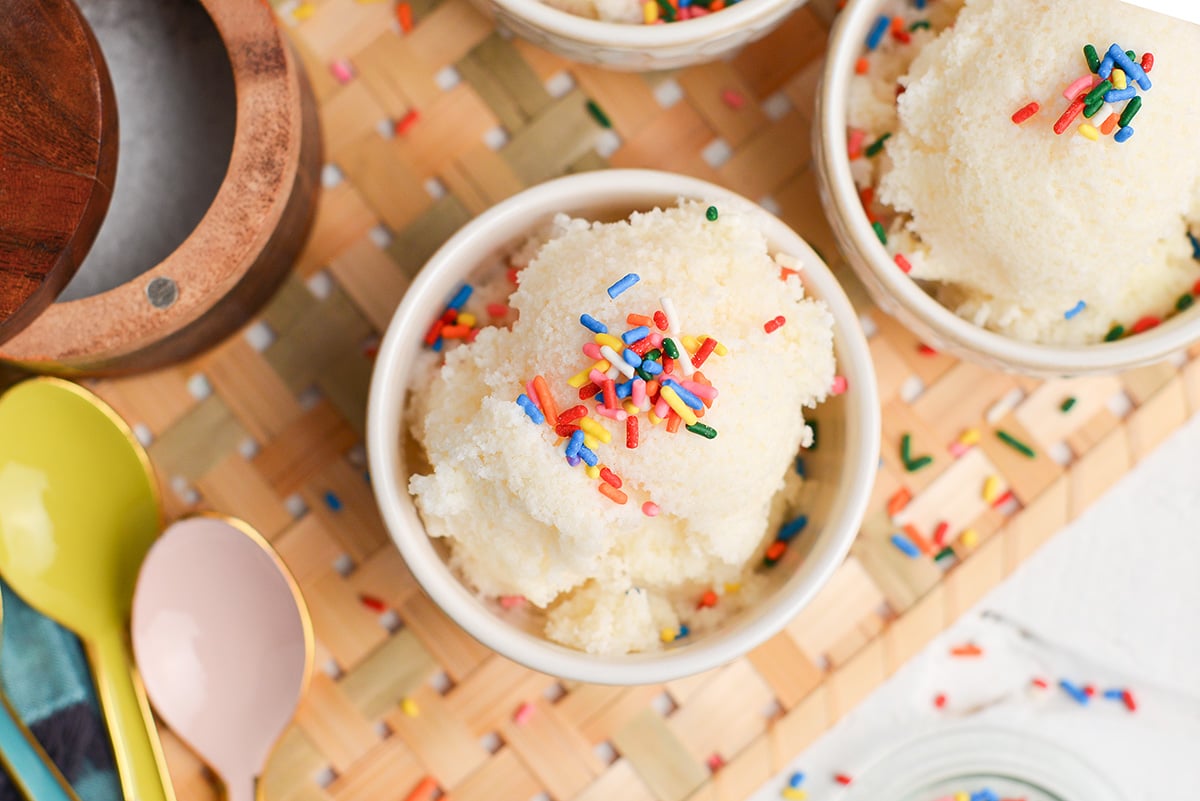 overhead shot of a scoop of vanilla snow cream with sprinkles