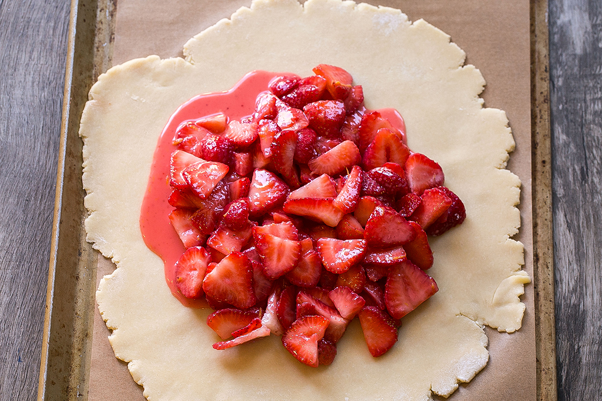 strawberry filling on raw pie crust