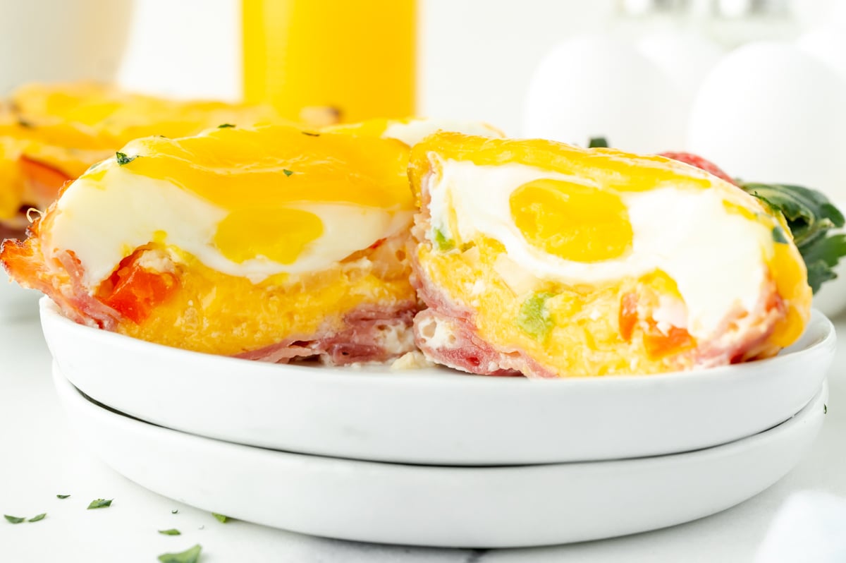 straight on shot of egg cup cut in half on plate