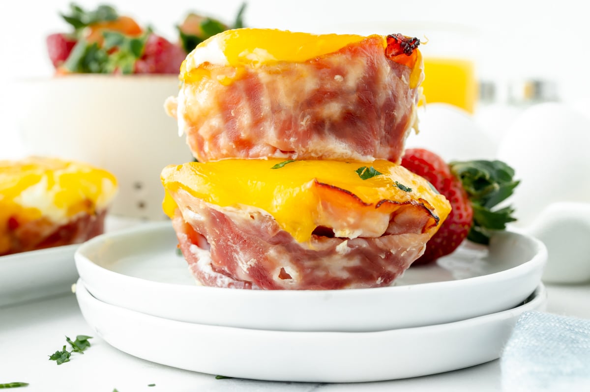 straight ahead shot of stack of two western egg muffins on plate