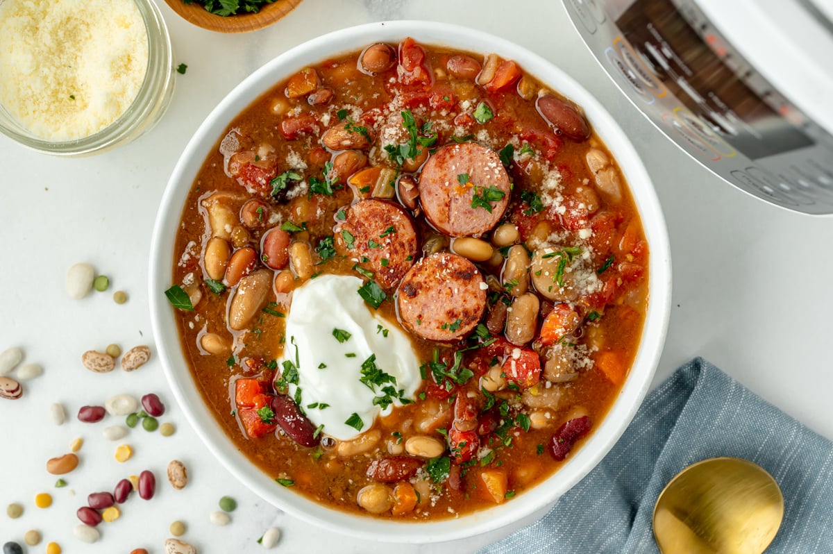 overhead shot of bowl of soup topped with sour cream