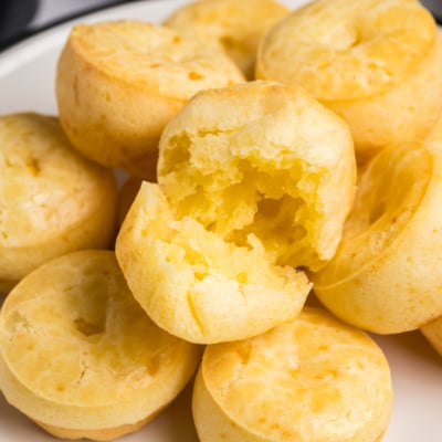 close up of brazilian cheese bread roll cut in half
