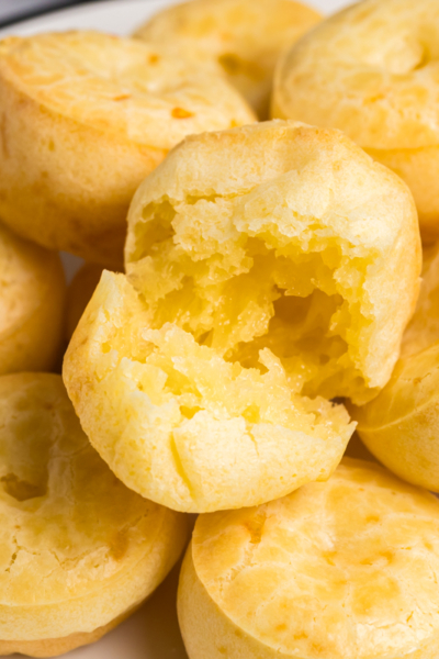close up of brazilian cheese bread roll cut in half