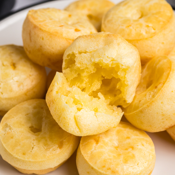 close up of brazilian cheese bread roll cut in half