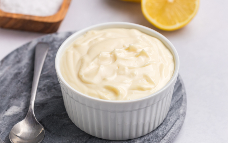 close up angled shot of bowl of aioli