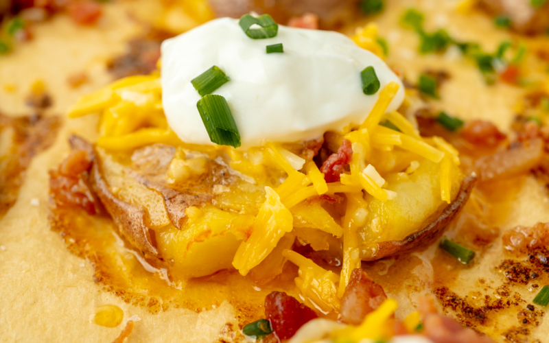 close up angled shot of loaded smashed potato