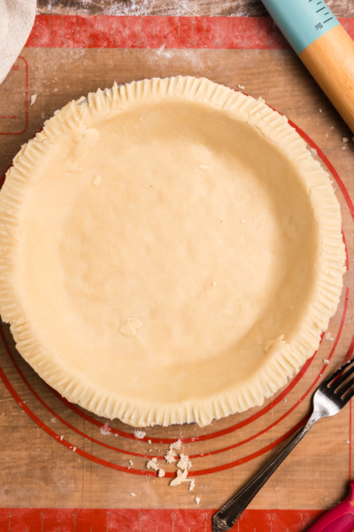 overhead shot of homemade pie crust in pie plate