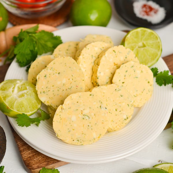 angled shot of plate of slices of flavored butter