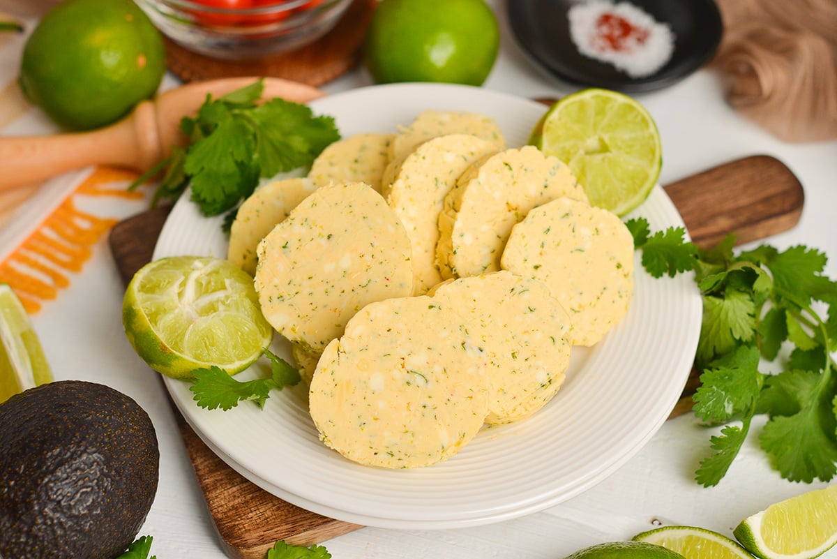 angled shot of plate of slices of flavored butter