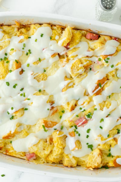 croque monsieur casserole topped with sauce