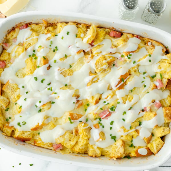 croque monsieur casserole topped with sauce