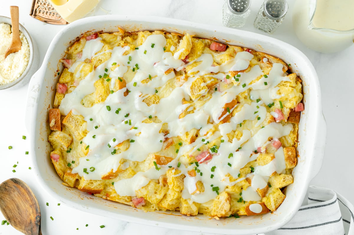 croque monsieur casserole topped with sauce